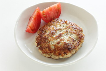 Homamade tofu patty with tomato