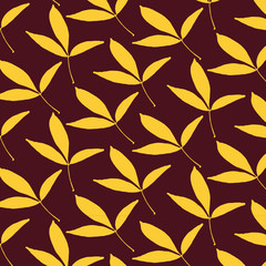 Hand drawn leaves vector pattern in yellow and red colors palette
