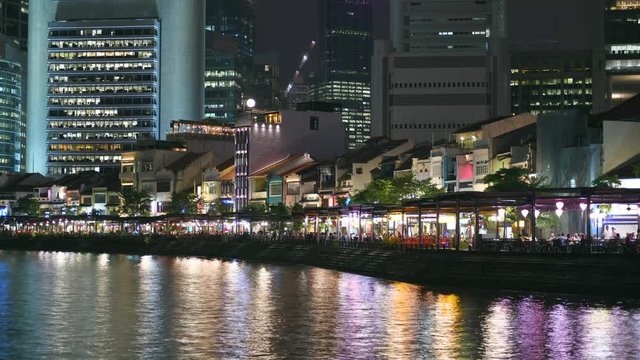 4K Time lapse of boats streaming past in Clarke quay, the most popular nightlife spot in Singapore