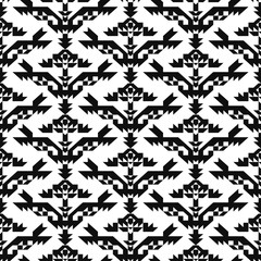 Fototapeta premium Seamless pattern with american indian style. Triangle ornament plaid. Navajo background. Textile geo print. Tribal swatch.