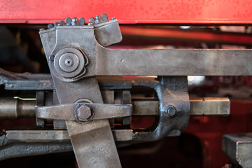 technology concept - vintage machinery closeup - old locomotive detail