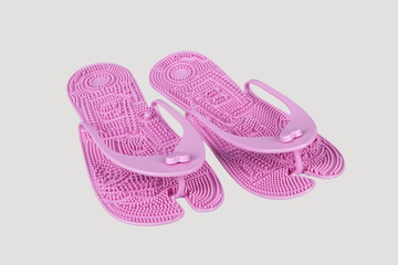 Massage wellness sneakers for spa procedures on a gray background