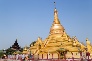 Gilded Ein Daw Yar Pagoda in Mandalay, Myanmar (Burma) on a sunny day.