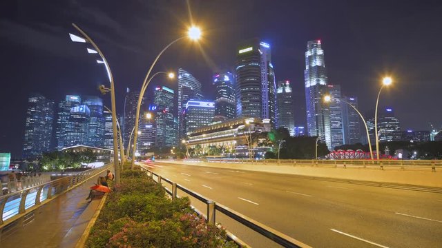 4k Timelapse of Singapore City Skyline and Financial district across Marina Bay under a beautiful blue sky in Singapore