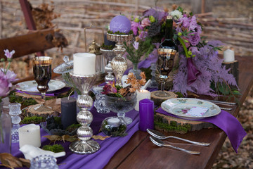 decorated table in the woods