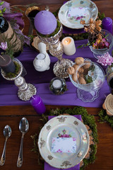 decorated table in the woods