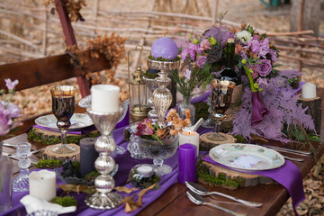 decorated table in the woods