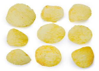 Collection of fried potato chips snack in white bowl isolated on white background, Junk food. File contains a clipping path.