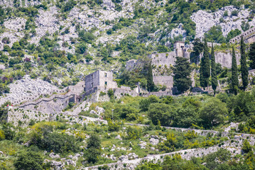 Obraz premium Ancient walls on St John hill in Kotor town, Montenegro