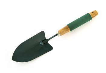 Green Trowel plant a tree is agricultural tool. Used to plant or move sapling with soil. isolated on white background.