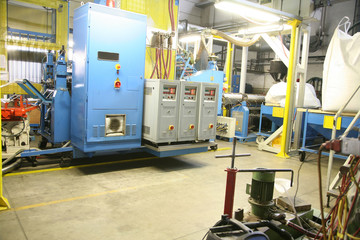 factory shop production of polyethylene film mechanisms machine tools lifting mechanism wires hoses switches pressure gauges pressure temperature molten mass work place enterprise