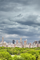 Fototapeta na wymiar Stormy sky over the Central Park and Manhattan skyline, New York City, USA.