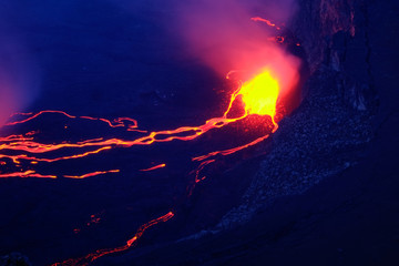 Lava and steam in crater of Nyiragongo volcano in Virunga National Park in Democratic Republic of Congo, Africa