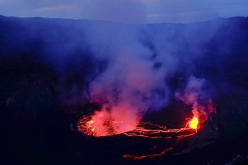 Lava and steam in crater of Nyiragongo volcano in Virunga National Park in Democratic Republic of...