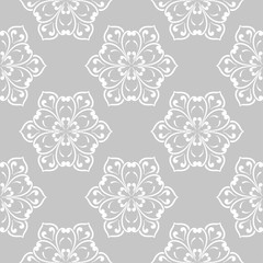 Gray and white floral ornament. Seamless pattern