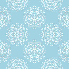 White floral seamless pattern on blue background