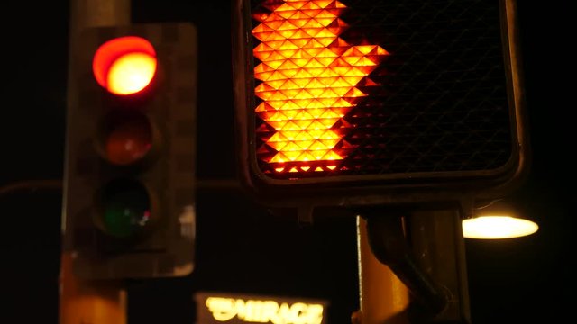 Crosswalk signal illuminated at night