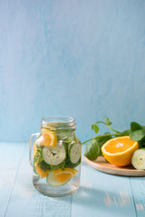 Detox water with vegetables and fruits. Diet healthy eating and weight loss.