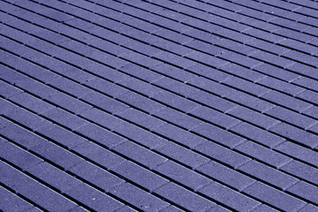 Cobble stone pavement surface pattern in blue tone.