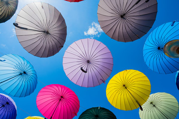 Colorful umbrellas background. The sky of colorful umbrellas