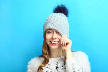 girl in a cap with a pompon