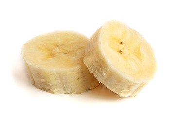 Banana slices isolated on a white background. Flat lay, top view