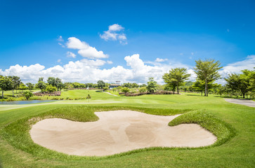 The sand Bungker in golf course with blue cloud sky background 