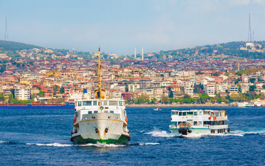 Fototapeta premium Istanbul cityscape, passenger ferries cross strait of Bosphorus