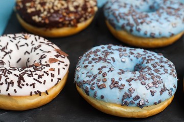 Several donuts with slightly atypical coloring