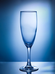 Glass of wine on a blue background