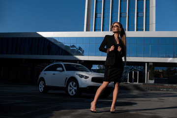 Business woman in black suit.