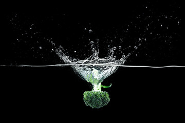 broccoli in water with splash
