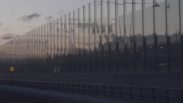 Reflections in glaswall by the freeway