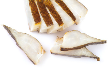 Pieces of smoked halibut isolated on white