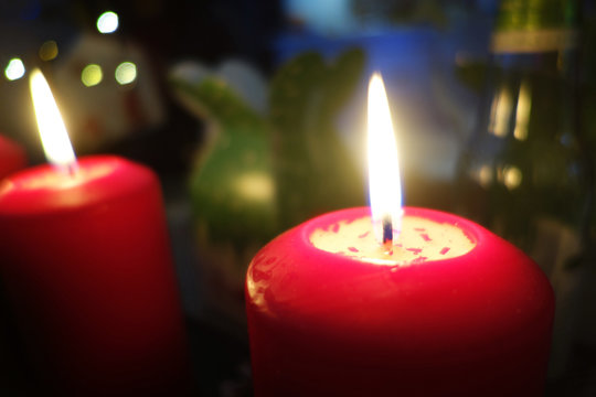 Christmas candle burning at night