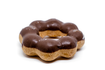 Delicious chocolate doughnut, a small fried cake of sweetened dough on white background for snack food concept