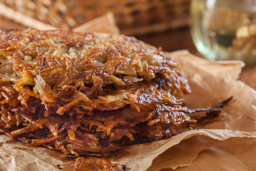 Hash brown, potato pancakes on paper