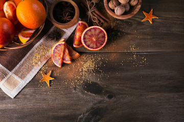 Fresh red orange fruit, anise, cinnamon and walnuts