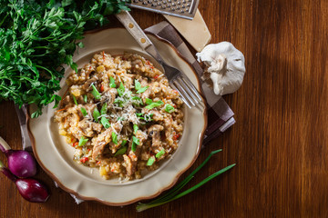 Risotto with champignon mushrooms, pork and parmesan