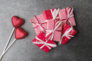 Fototapeta premium Pile of red gift boxes on Valentines day.
