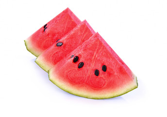 closeup of some pieces of refreshing watermelon on a white background