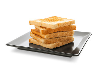 Plate with toasted bread on white background