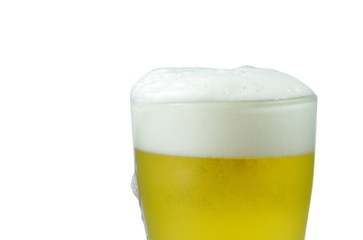 cold beer with frothy in glass on white background