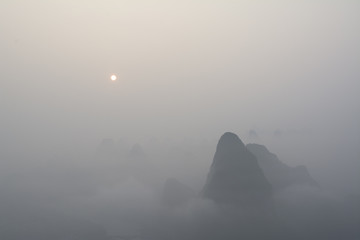 sunset on the karst mountains