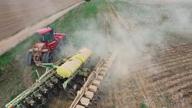 tractor preparing land for sowing sixteen rows aerial