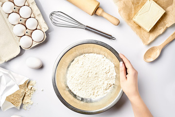 Hand sift flour. Bakery prepare for make cake. Top view