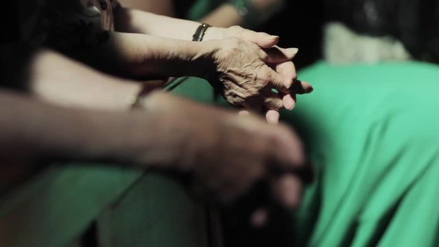 Old catholic women pray to god in church close up hands fold together fingers laced rack focus faceless side view 1080 hd. Penance forgiveness redemption obedience unconditional love wish hope concept