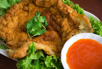 well done omelette with pork and chili sauce.