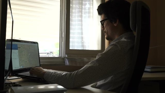 Young man in his office.