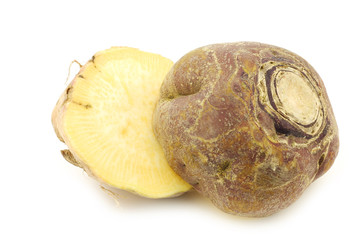 one fresh cut turnip(Brassica rapa rapa) on a white background